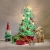 Lundby 60-604700 - Weihnachtsdeko Christbaum mit LED-Licht Puppenhaus - 7-teilig - Puppenhauszubehör - Weihnachtsbaum - Weihnachtsmann - Zubehör - ab 4 Jahre - 11 cm Puppen - Minipuppen 1:18 - 3