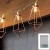 CozyHome Kupfer LED geometrische Lichterkette – 4 Meter Gesamtlänge | 10 LEDs warm-weiß | rose gold pyramidenform | Batteriebetrieben – 3x AA Batterien - 1